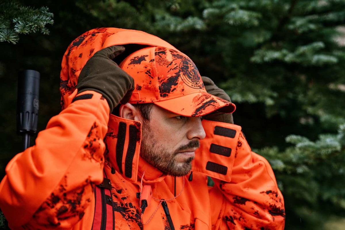 Härkila Herren Jagdjacke Wildboar Pro Blaze Camo HWS Insulated in AXIS MSP®CE orange – Kapuze