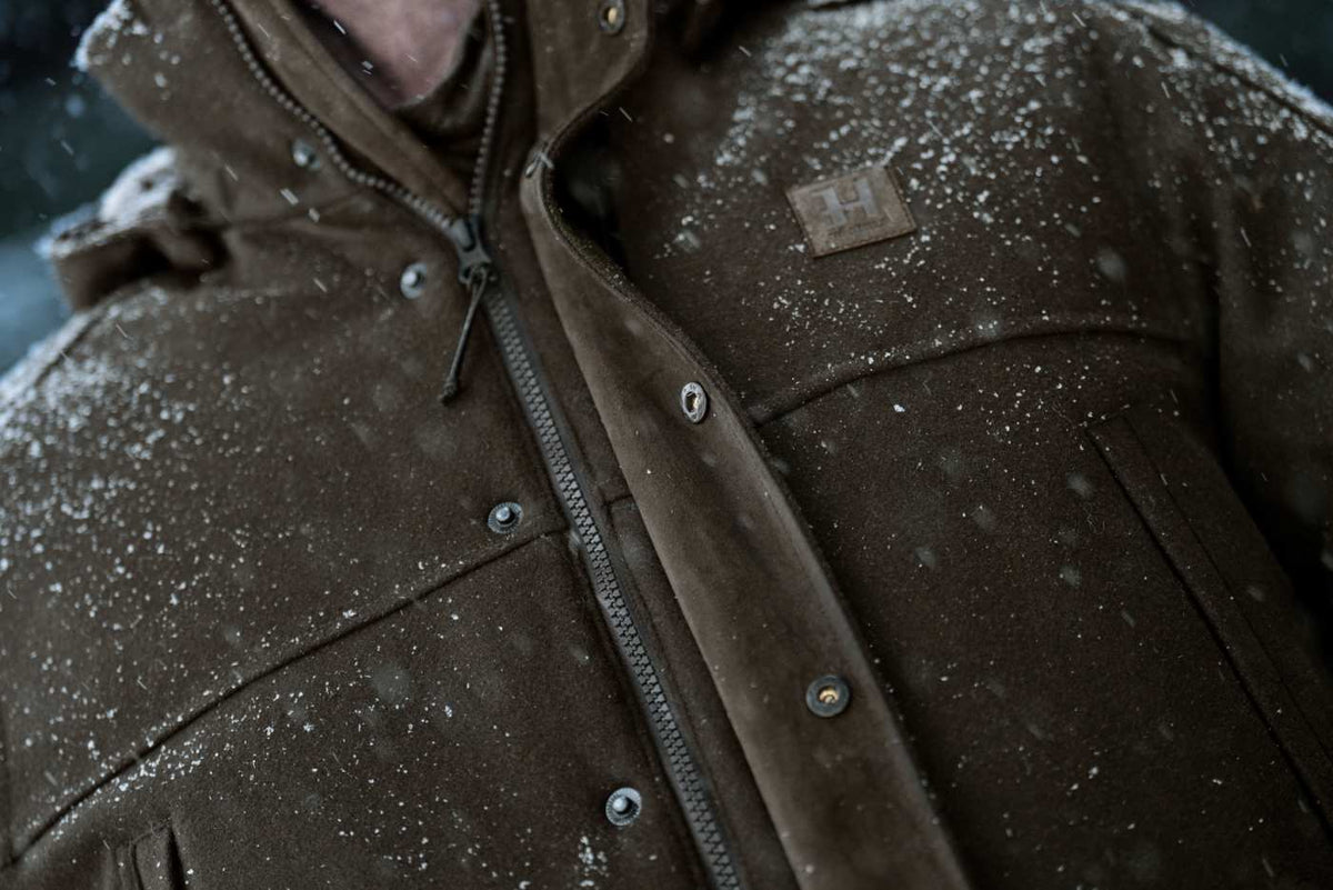 Härkila Herren Winter-Jagdjacke Kodiak CleverWool HSP Insulated in Dark hunting green/Shadow brown – Frontverschluss