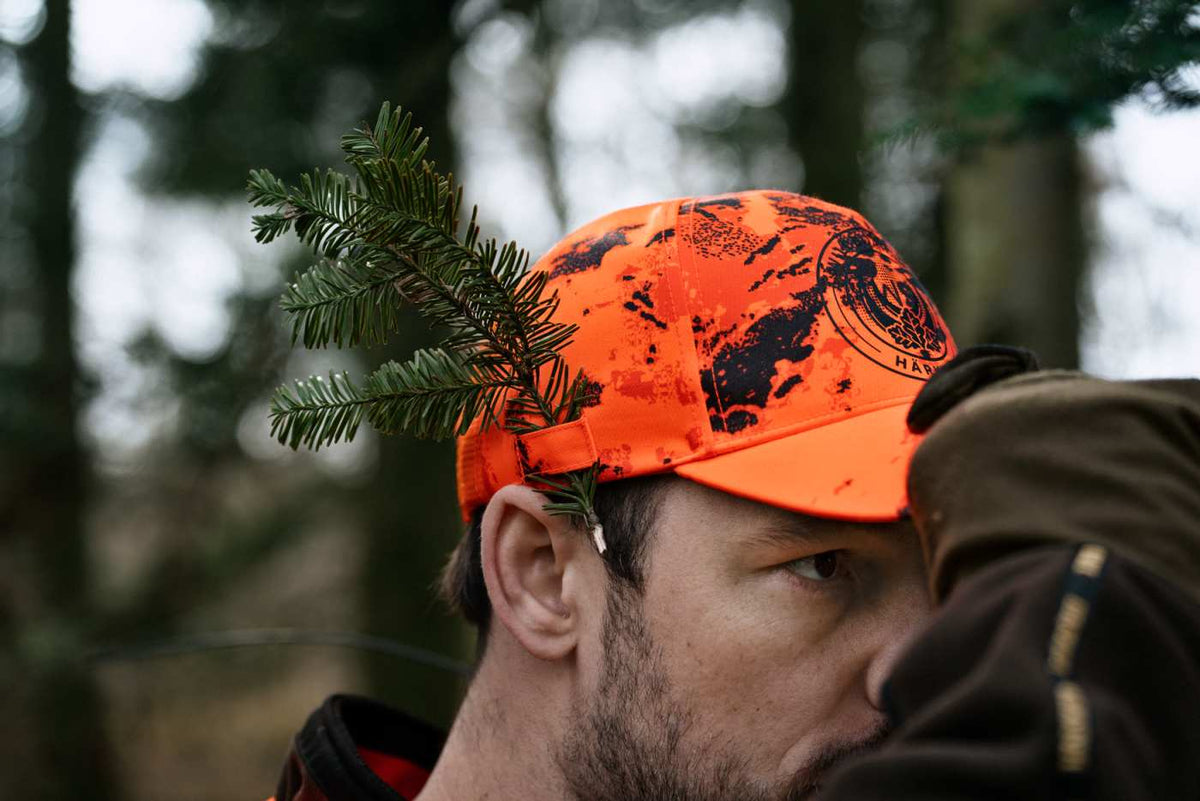 Härkila Kappe Wildboar Pro Blaze Camo in AXIS MSP®CE orange/Shadow brown – im Revier