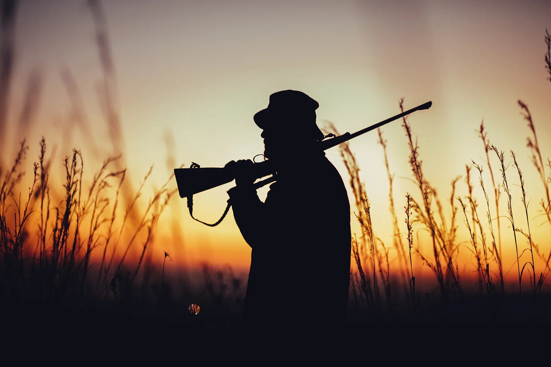 Jäger im Sonnenuntergang