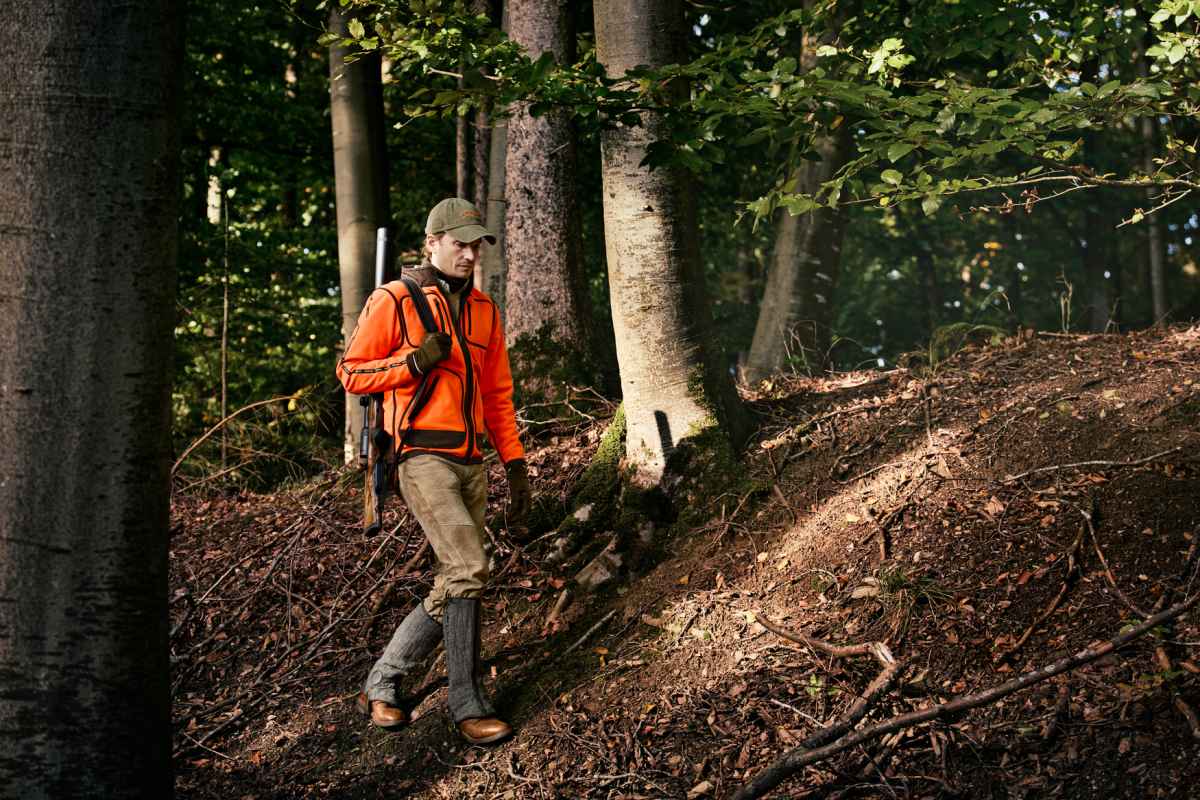 Härkila Herren Wendejacke Kamko Blaze Fleece in Orange blaze/Willow green – auf der Drückjagd