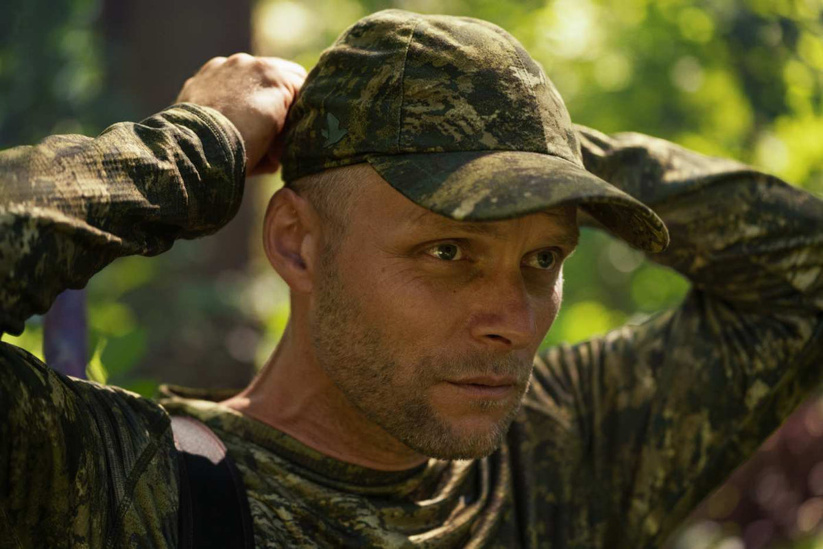 Seeland Camo-Jagdkappe Avail in InVis green – im Wald